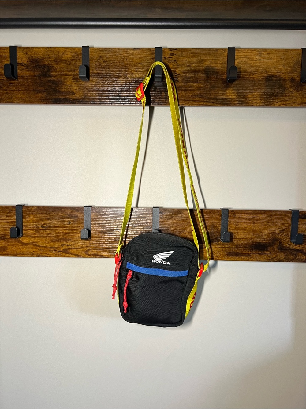 Forever 21 x Honda Black Crossbody Bag with Yellow Strap and Red Accents
